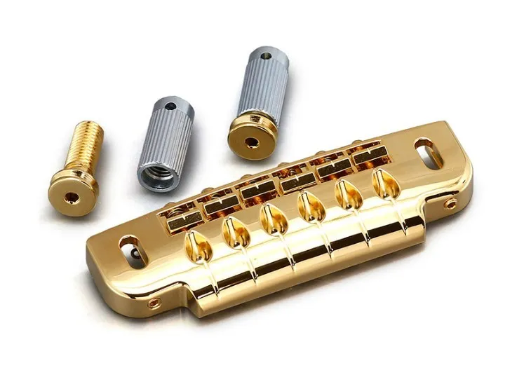 Gotoh 510UB Uzamykateľná kobylka Wrap-around pre 6-strunovú gitaru – Zlatá